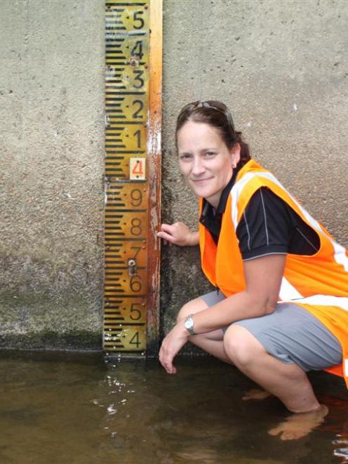 Environment Southland senior environmental technical officer Dianne Elliotte checks the level of...