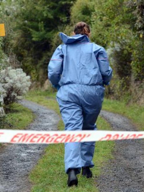 Environmental Science and Research scientists examined a Bay Rd, Purakaunui property on Saturday....