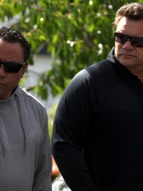Ex-All Blacks Ofisa Tonu'u and Michael Jones pay their respects at Lomu's home. Photo / Dean Purcell