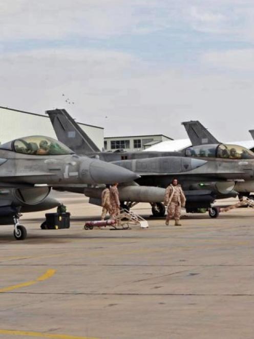F16 fighter jets from the United Arab Emirates at an air base in Jordan. REUTERS/Petra News Agency