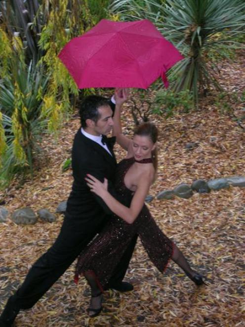 Fabio and Ana Robles, Australian tango dancers, dance in the rain in Wanaka yesterday. Photo by...