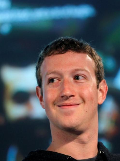 Facebook CEO Mark Zuckerberg listens to a question during a media event at Facebook headquarters...