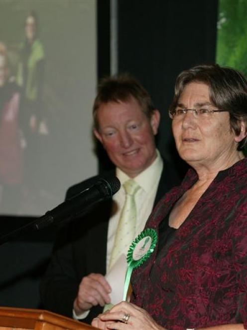 Facilitator Clair Higginson speaks at the awards function in Wellington, while Environment...