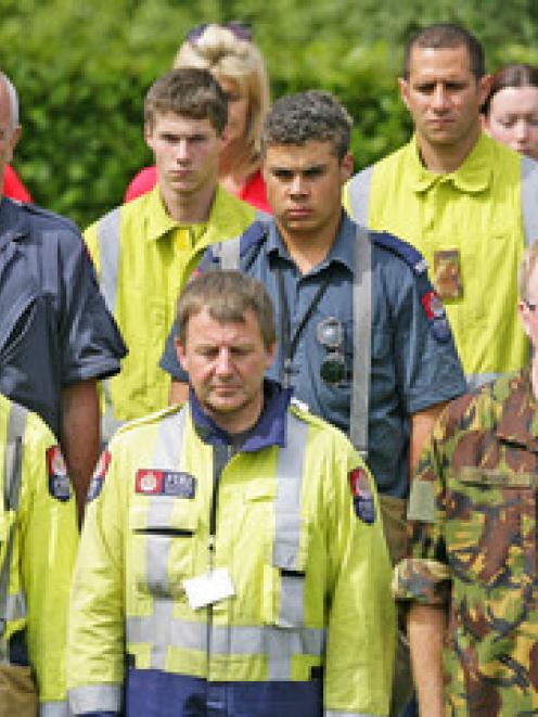 New Zealand fire fighters stand for two minutes silence one week on since the 6.3 magnitude...