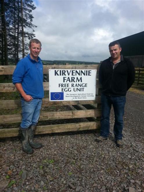 Farmer Niall Armstrong (left) shows Nuffield scholar Steve Wilkins around Kirvennie Farm in...
