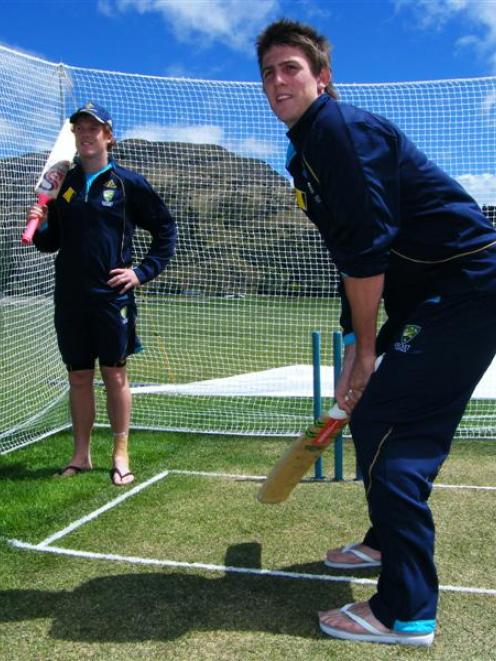 Fast bowler Alister McDermott (left), captain and batsman Mitchell Marsh and the rest of the...