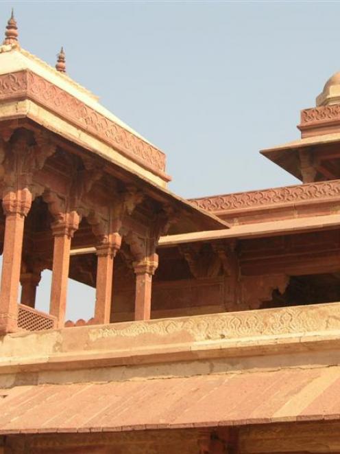 Fatehpur Sikri, meticulously carved in pink stone, was once the glorious capital of the Indian...