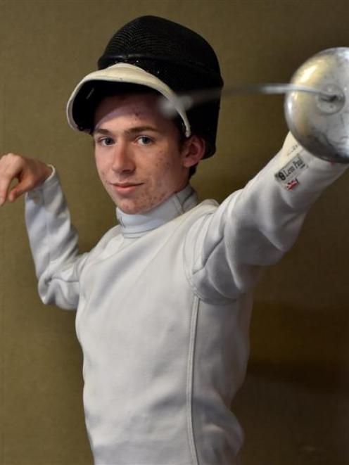 Fencer Louis Jennings (16), of John McGlashan College, takes guard at his school last week. Photo...