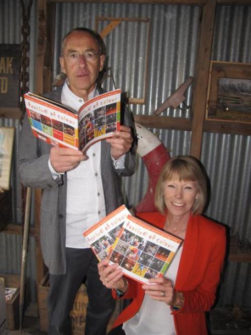 Festival of Colour director Philip Tremewan (left) and chairwoman Hetty van Hale hold brochures...