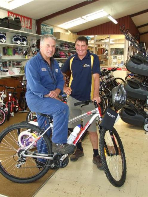 Findlaters Yamaha owner Chris Evans, under the watchful eye of Sport Clutha co-ordinator Tiny...