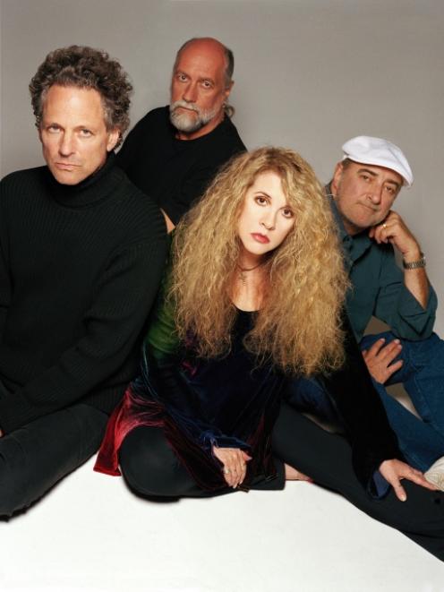 Fleetwood Mac will play in Auckland in December as a legal dispute intensifies over the group's...