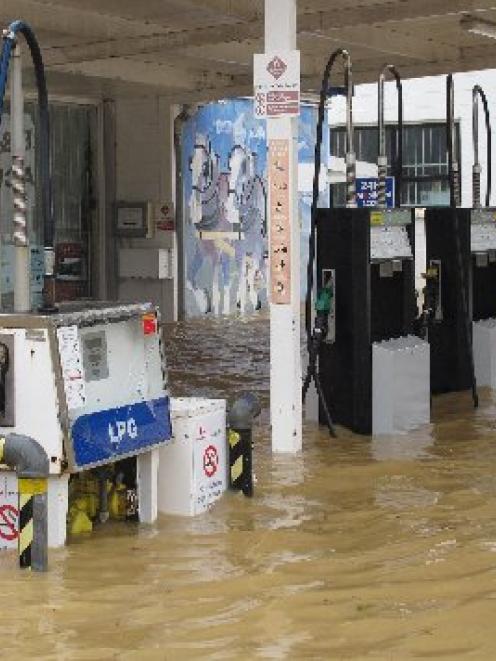 Floodwater sweeps through the low-lying Far North township of Kaeo yesterday. Photo supplied.