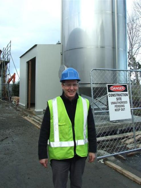 Fonterra Stirling site manager Mark Leith with the chilled-water treatment plant water tank which...