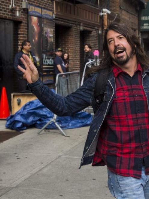 Foo Fighters singer Dave Grohl departs Ed Sullivan Theater in Manhattan after taking part in the...