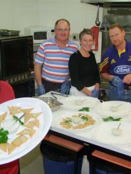 Alison Mead with some Indian samosas made by chefs (from back, left), Allan Roulston, Julie Feary...