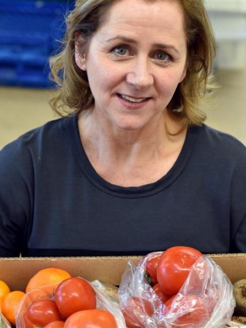 FoodShare chief executive Deborah Manning with some of the fruit and vegetables donated to the...
