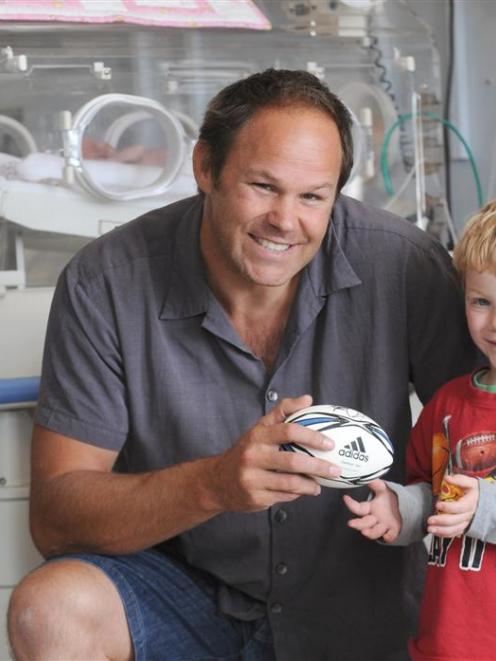Former All Black Josh Kronfeld meets Andrew Sinclair, who was born prematurely. Photo by Peter...