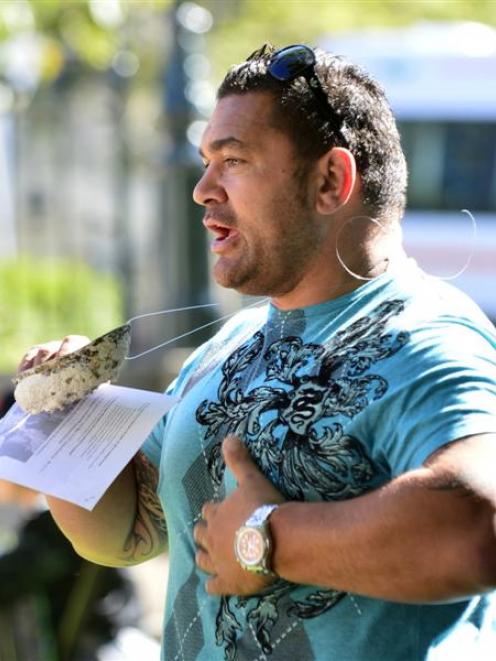 Former All Black Kees Meeuws rallies support in Dunedin yesterday to protect the coastline closed...