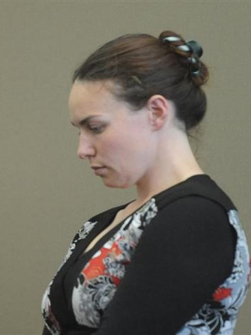 Former firefighter Michelle Harvey in the dock in the Dunedin District Court yesterday. Photo by...
