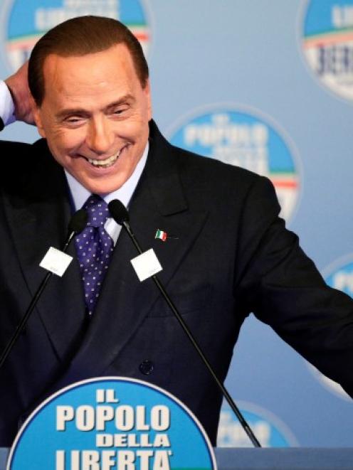 Former Italian prime minister Silvio Berlusconi speaks during a political rally in downtown Rome...