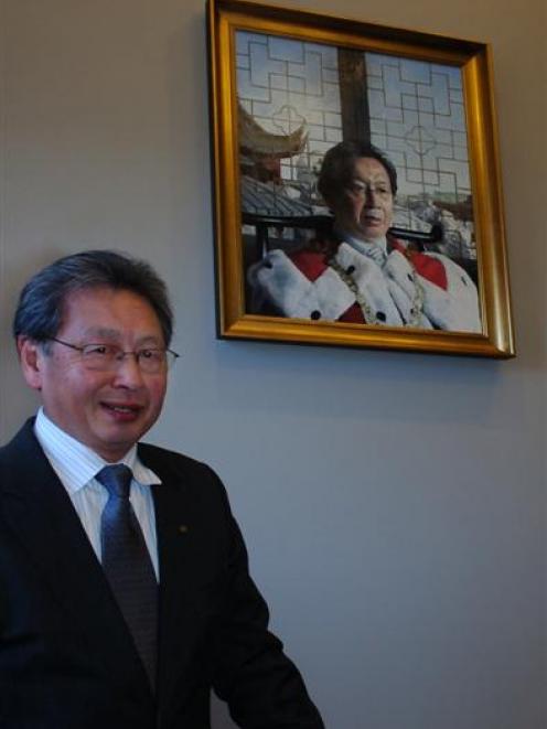 Former mayor Peter Chin with his portrait, which was unveiled at the Dunedin Municipal Chambers...