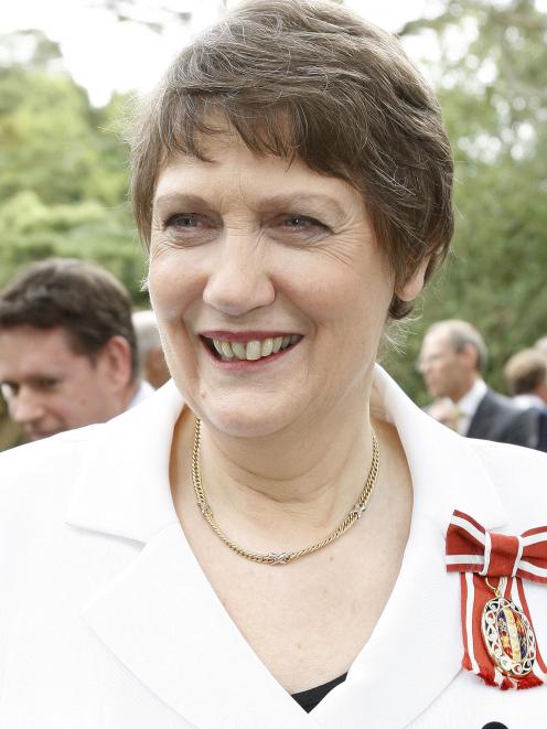 Former New Zealand Prime Minister Helen Clark wears the badge of the Order of New Zealand she...