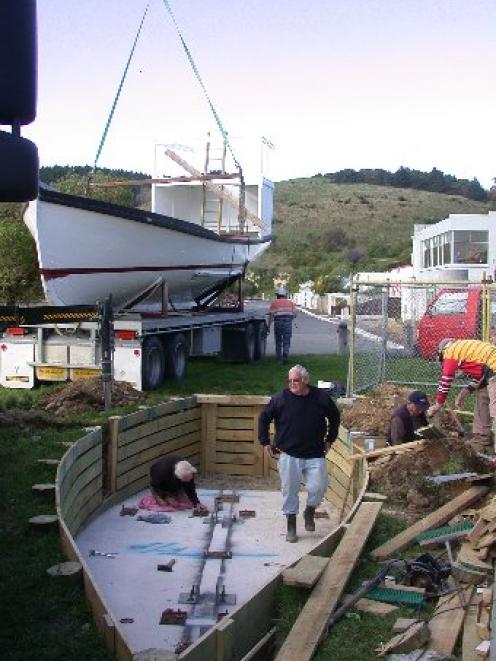 Former Oamaru-based fishing boat  Moana is lifted into a new berth as a pirate ship at the...