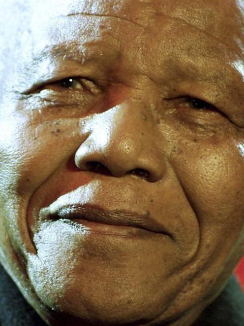 Former South African President Nelson Mandela is shown in this file photo. REUTERS/Jonathan Evans...