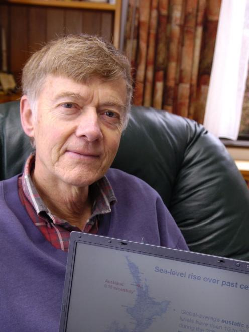 Former University of Otago School of Surveying dean Prof John Hannah examines sea-level rise data...
