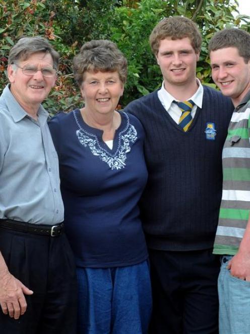 Foster parents Trevor and Linda Wheeler with their foster children, Rodger (18) and David (20)...