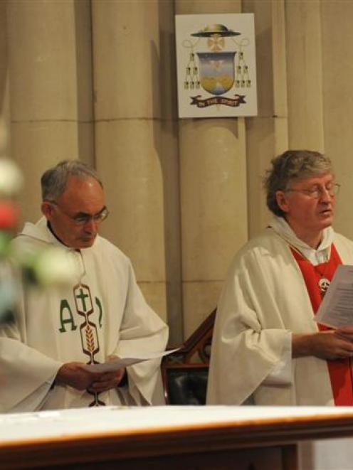 Fr John Harrison and the Roman Catholic Bishop of Dunedin, the Most Rev Colin Campbell, officiate...