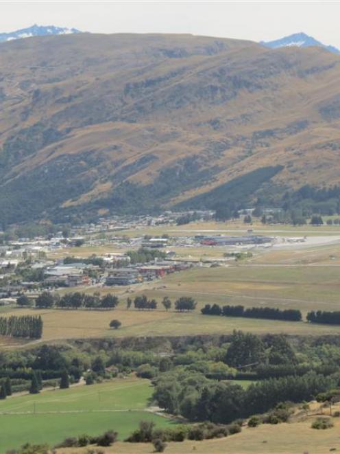 Frankton Flats and Queenstown Airport, as seen from the slope of the Remarkables. Photo by James...