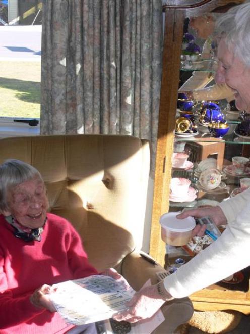 Frankton pensioner Sadie Miller (98) receives her daily meal from Meals on Wheels volunteer Helen...