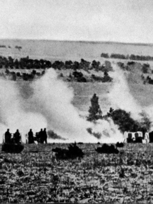 French artillery in action: a battery of heavy artillery shelling German lines near the Argonne...