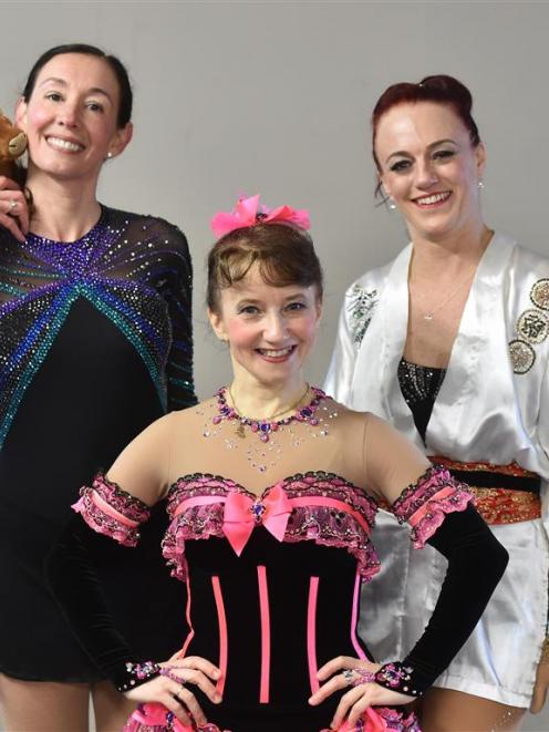 Friends and competitors (from left) Leslie Amacker, Elena Rickmann and Melissa Staples catch up...