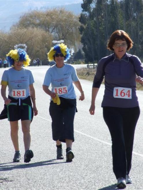 From left, Denise Potter (Alexandra), Jacqui Parsons (Clyde) and Carol Stevens (Wanaka) stride...