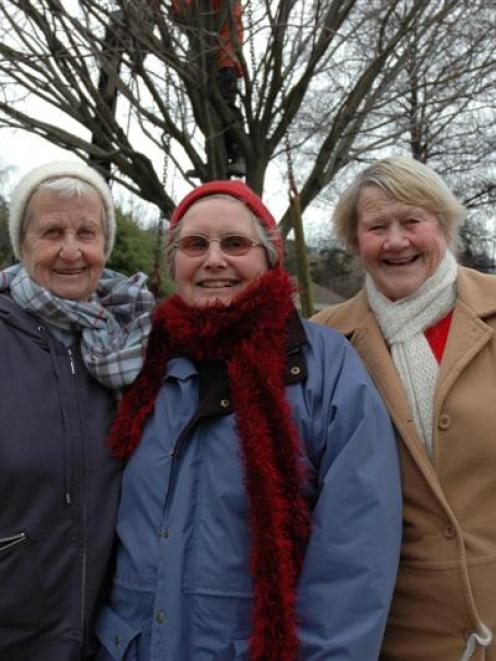 From left, Donalda Anderson, Francis Lewis and Joan Cooke, the women who planted an elm tree over...