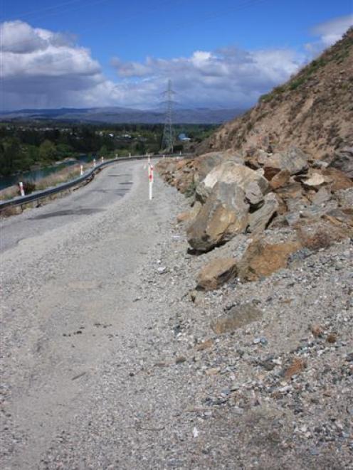 Fruitgrowers Road, one lane of which is buried by debris. Photo by Leith Huffadine.