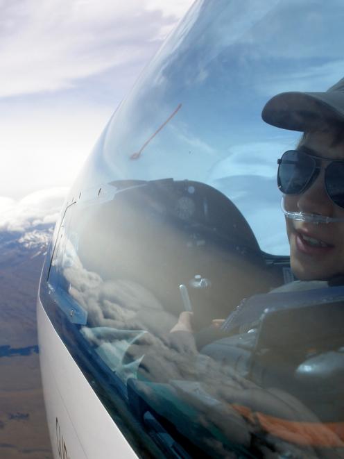 Gavin Shamis, from South Burlington, in Canada, takes control of a glider at 20,000ft, near Mt...