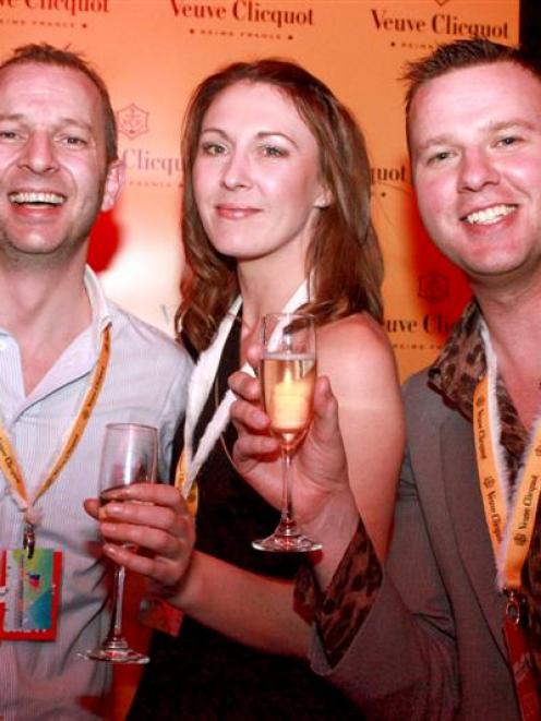 Gay Ski Week organisers Mike Sanford (left) and Craig Lawson with Carla Forbes at the opening...