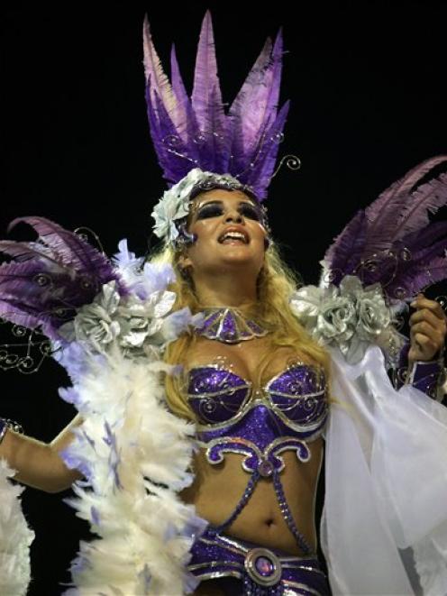 Geisy Arruda, from Gavioes da Fiel samba school, performs during carnival celebrations at the...