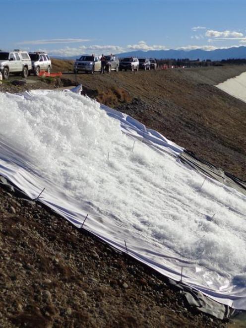 Genesis workers start to refill the Tekapo canal after repairing leaks. Photo from Genesis Energy.