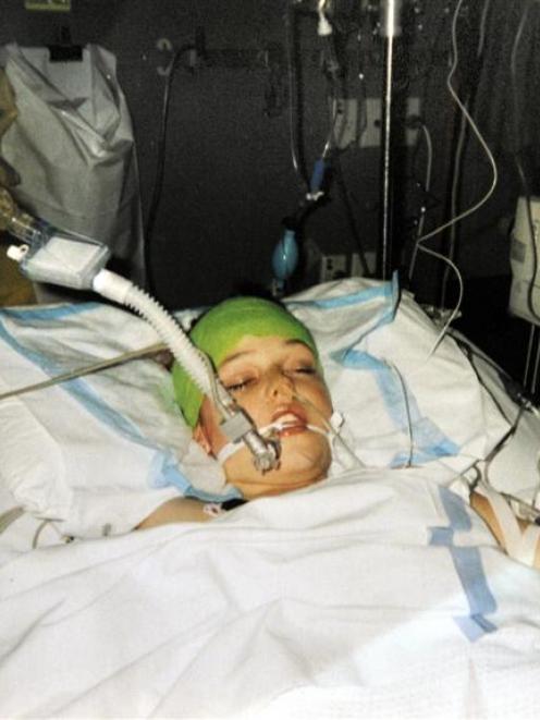 George Clarke, aged 13, pictured after his life-saving neurosurgery in Dunedin Hospital seven...