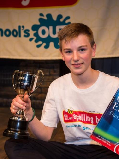 George Sabonadiere with the New Zealand Spelling Bee trophy. Photo supplied