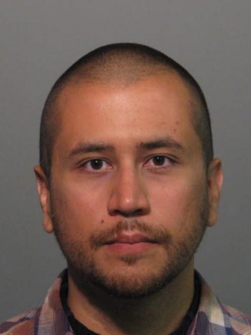 George Zimmerman is pictured in this Seminole County, Florida, Sheriff's Office booking...