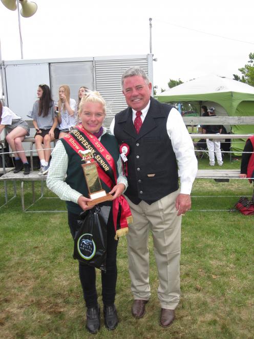 Georgia Davies, stands with American cattle judge Tom Turner at last year's Canterbury A&P Show....