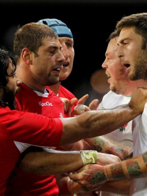 Georgia's Givi Berishvili and England's Matt Banahan (R) face off during their Rugby World Cup...