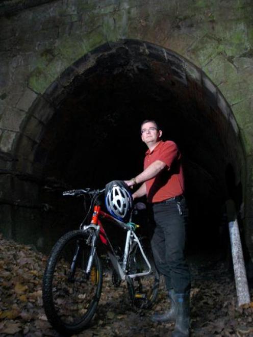 Gerard Hyland is seen at the entry of the old Caversham railway tunnel in this file photo. Photo...
