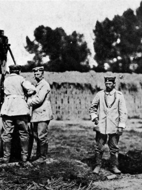 German soldiers filling their leather water-sacks in a Belgian village. - Otago Witness, 4.11...