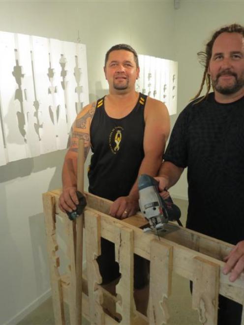 Gisborne artists Simon Lardelli (left) and Drew Hill present the raw material of pallets they use...